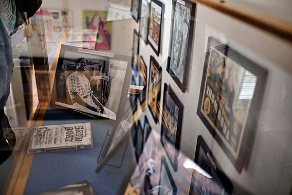 A second-floor case displays a photo of Paul Robeson as Joe in a scene from "Showboat" where he sings "Ol' Man River." 