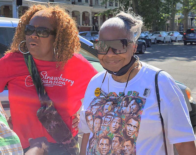 Vernoca L. Michael, right, former executive director of the Robeson House, with Tonnetta C. Graham, president of the Strawberry Mansion CDC, during Porchfest 2022 at the Paul Robeson House & Museum, June 4, 2022.