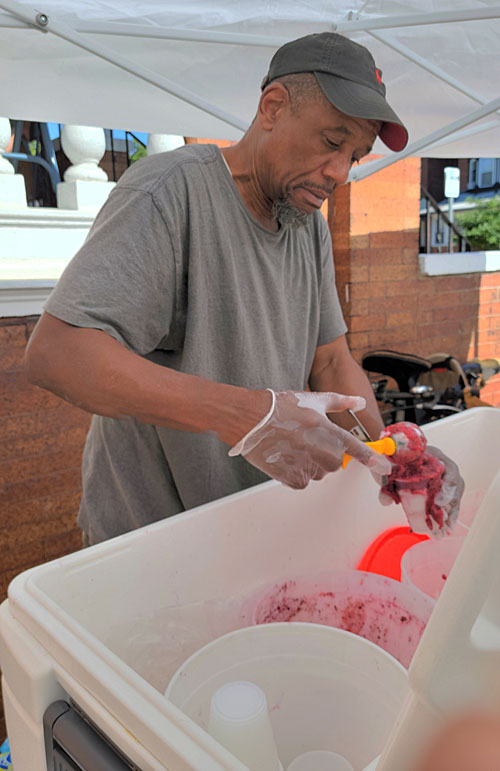 Tim keeps everyone chilled with a treat from Siddiq's Water Ice in West Philadelphia.