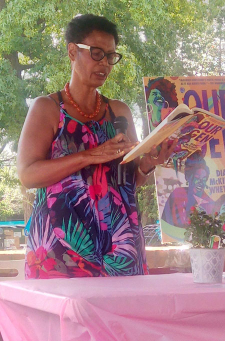 Diane McKinney-Whetstone reads from her book at an event at the Nile Swim Club. Photo by Vernoca L. Michael. 