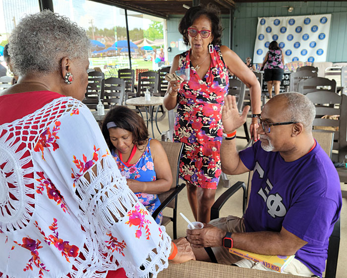 From left: Donna Samuel, docent at the Paul Robeson House & Museum; Lisa Beavers; Margaret Livingston, president of the Walnut Hill Community Association, and Herman Beavers, longtime Robeson House supporter who is a professor of English and Africana Studies at the University of Pennsylvania (and husband of Lisa). Photo by Sherry L. Howard.