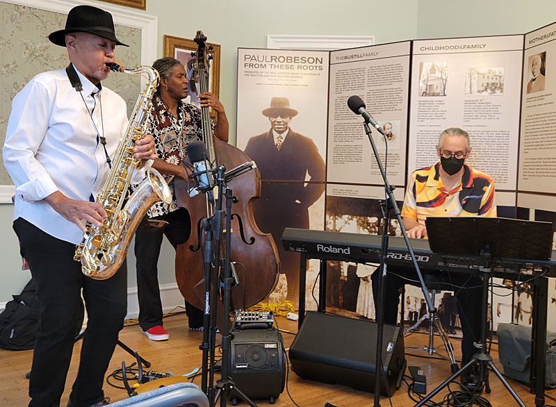 The Afro Jazz Trio perform at the Paul Robeson House & Museum, Sept. 11, 2022. From left, Laurent Bass; Bert Harris, David Dzubinski. 