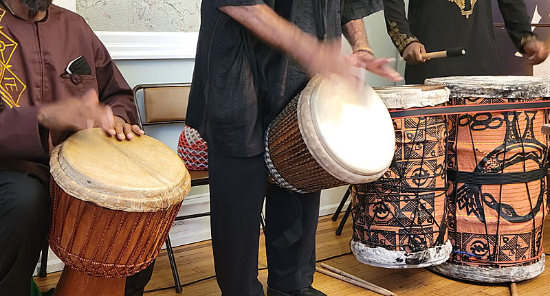 Close-up of the hand movements of members of the Tyehimba African Drum and Dance Ensemble. 